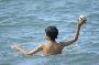 playing football in the china sea with the local kids in hoi an