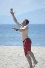 craig playing football on the beach in hoi an