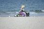 local vietnam lady selling food on china beach